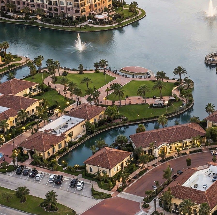 Aerial view of Cathedral Lakes with a fountain on the lake
